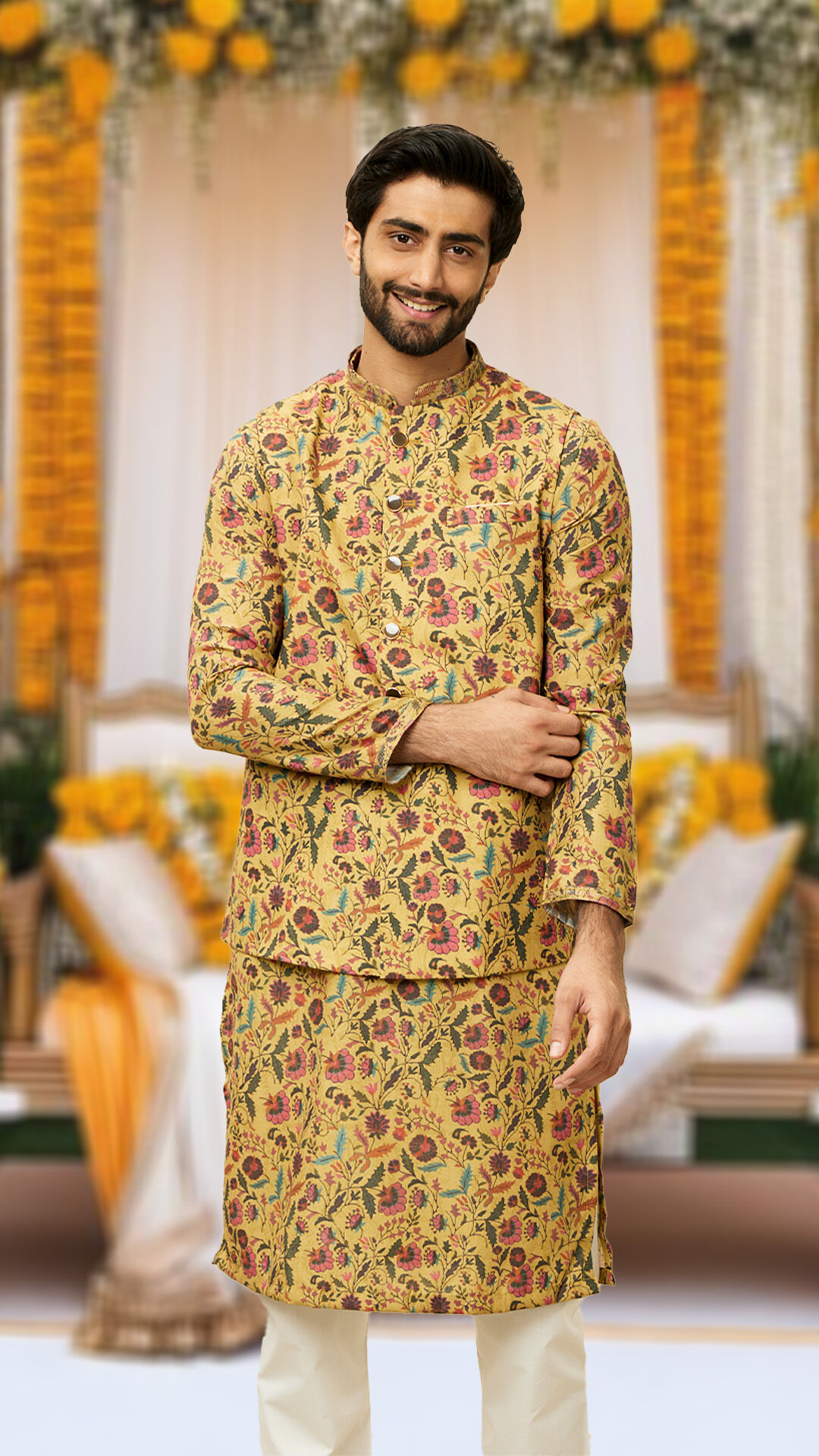 A groom wearing printed kurta pajama with printed jacket for haldi ceremony